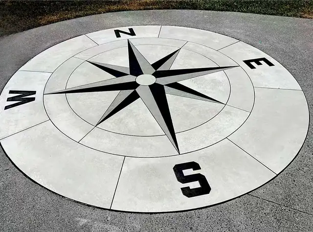 The hand-cut compass floor made by TZ Tiling from a picture on A4